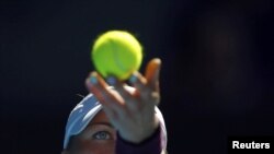 Australia - Vera Zvonareva of Russia serves to Kim Clijsters of Belgium during their semi-final match at the Australian Open tennis tournament in Melbourne, 27Jan2011