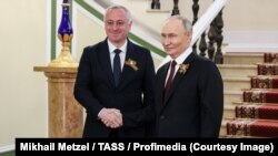 Бадра Гунба и Владимир Путин