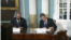 Armenian Foreign Minister Ararat Mirzoyan (L) and U.S. Secretary of State Antony Blinken sign a strategic partnership agreement in Washington, January 14.