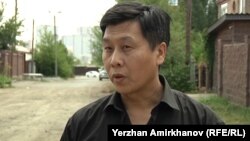 Правозащитник Евгений Цай, руководитель общественного объединения «Камкорлык». Астана, 30 июля 2015 года.  