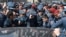 Armenia -- Riot police clash in Yerevan with employees of the Spayka company protesting against the arrest of its chief executive, Davit Ghazarian, April 4, 2019.