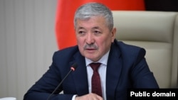 Адылбек Касымалиев.