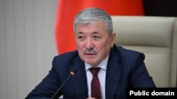 Адылбек Касымалиев.