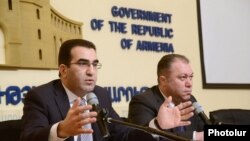 Armenia - Deputy Ministers of Economy Garegin Melkonian and Tigran Harutyunian give a press conference in Yerevan, 18Feb2014.