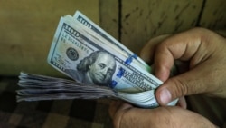 Aşgabat: Gara bazarda dollar 24 manada çenli arzanlady