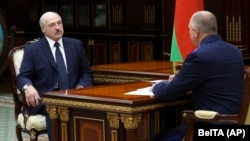 Belarusian leader Alyaksandr Lukashenka (left) and Ivan Naskevich (file photo)