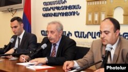 Armenia - Armen Yeghiazarian (C), acting director of the Center for Legislative Regulation, at a news conference in Yerevan, 11Jul2012.