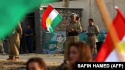 عکس آرشیوی از اعضای گروه پیشمرگه وابسته به حزب دموکرات کردستان ایران در اربیل عراق، مهر ۱۳۹۶