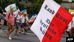 Привърженици на движението "Граждани на райха" по време на митинг в Мюнхен, 31 август 2024 г.