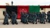Afghan policemen march during a graduation ceremony earlier this month.