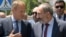 Armenia-- Armenian Prime Minister Nikol Pashinian and European Council President Donald Tusk walk in downtown Yerevan after their meeting on July 10, 2019. 