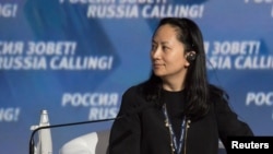 منگ وانژو در این تصویر در کنفرانسی در مسکو در سال ۲۰۱۴ 