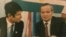 Samandar Qoqonov (left) with late President Islam Karimov