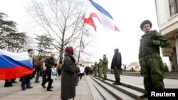 Ukraine -- Pro-Russian supporters take part in a meeting in Simferopol, March 6, 2014