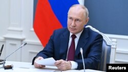 On July 21, Russian President Vladimir Putin accused Warsaw of harboring territorial ambitions in western Ukraine -- an oft-repeated claim by both Russia and Belarus. (file photo)