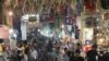 Iran – Iranian people walk around the Tehran Grand Bazar (Market), as symbol of Iran economy situation, undated