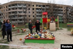 Место скорби по жертвам российского ракетного удара по Кривому Рогу 5 апреля