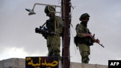 نیروهای ارتش روسیه در روستایی در نزدیک شهر حمات (حما)