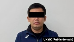 Курулуш компаниясынын кармалган жетекчиси. УКМК тараткан сүрөт.