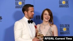 Актори Емма Стоун (п) і Раян Ґослінґ, які зіграли головні ролі в «Ла-Ла Ленді»