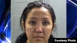 Маъмура Носированинг АҚШ полицияси томонидан ëйинланган суратидан унинг руҳий тушкунликка учраганини кўриш қийин эмас.