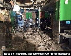 Дўконда портлаш содир бўлган жой