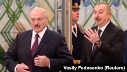 Аляксандар Лукашэнка (зьлева) і Ільхам Аліеў у Менску ў 2018 годзе