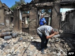 Пострадавший район в Оше, 2010 г.