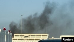 Дым после взрывов в Дохе, 9 сентября