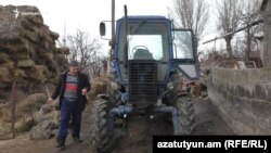 Armenia -- Gor Karapetian, a farmer from Haykavan village, shows his tractor that was stolen on the Turkish border in September, February 11, 2019.
