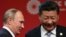 Chinese President Xi Jinping (right) and Russian President Vladimir Putin