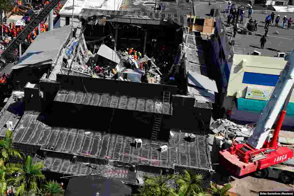 Снимок с дрона показывает место обрушившегося ночного клуба Jet Set в Санто-Доминго, Доминиканская Республика, 8 апреля 2025 года. REUTERS/Erika Santelice