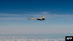 تصویر منتشر شده توسط نیروی هوایی سوئد از جنگنده روسیه بر فراز دریای بالتیک بعد از ورود به حریم هوایی استونی