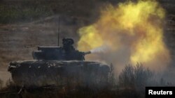 Ukrainian tank crews attend a military exercise in north Ukraine on September 8.
