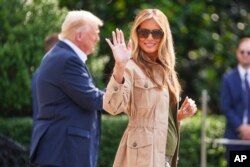 Мелания Трамп с мужем в Вашингтоне