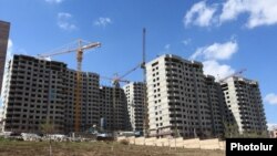Armenia - New apartment blocks are constructed in Yerevan, 4Apr2015.