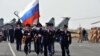 Armenia - Russian Air Force officers march at an airfield in Yerevan, 18Oct2013.