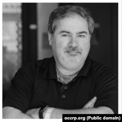 “Уюшкан кылмыштуулукту жана коррупцияны иликтөө» долбоорунун тең-негиздөөчүсү Дрю Салливан.