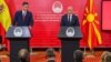 Spanish Prime Minister Pedro Sanchez (left) offers his backing for North Macedonia's EU bid in a news conference with Prime Minister Dimitar Kovachevski. 