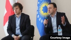 Ираклий Кобахидзе (солдо) жана Ираклий Гарибашвили.