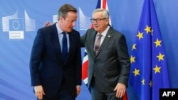 Британиянын премьер-министри Девид Кэмерон жана Европа комиссиясынын төрагасы Жан-Клод Юнкер 