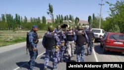 Police and military personnel on high alert in the Kyrgyz village of Kok-tash on April 29. 
