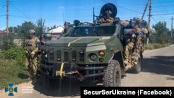 Бійці Центру спеціальних операцій «А» СБУ в звільненому від військ РС місті Куп’янську на Харківщині. Фото оприлюднене 10 вересня 2022 року