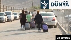 Eýranyň we Ermenistanyň arasyndaky serhet geçelgesi. Iýun, 2025. Eýranlylar ýurdundan gaçýarlar. 