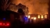 Smoke and flames rise after Ukrainian President Volodymyr Zelenskiy said a Russian-guided aerial bomb hit a blood-transfusion center, in the town of Kupyansk in northeastern Ukraine on August 5.
