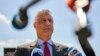 Kosovar President Hashim Thaci speaks to the media as he arrives at the Kosovo Specialist Chambers in The Hague on July 13. 