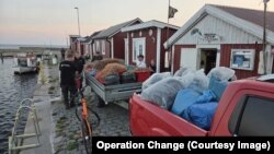 Украинаға жіберуге әзірленіп жатқан балық аулары. Швециядағы Гислов ауылы.