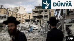 Eýranyň Tel-Awiwiň gündogaryndaky Bneý Brak sebitine uran raketa zarbasynyň netijeleri. 16-njy iýun, 2025 ý.