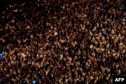 Опозиційні активісти протестують через загибель молодого активіста під час зіткнень в Каракасі 8 червня 2017 року