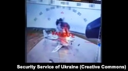 Скріншот із відео ударів СБУ по літаках стратегічної авіації Росії на аеродромі «Біла» («Бєлая», російською «Белая») в Іркутській област, 1 червня 2025 року